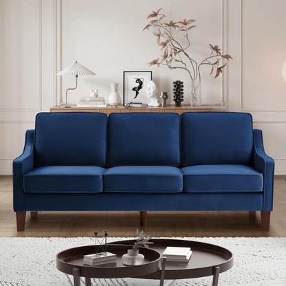 Elegant navy blue velvet 3-seater sofa with plush cushions, modern design, and wood frame – perfect for living rooms or formal lounges.