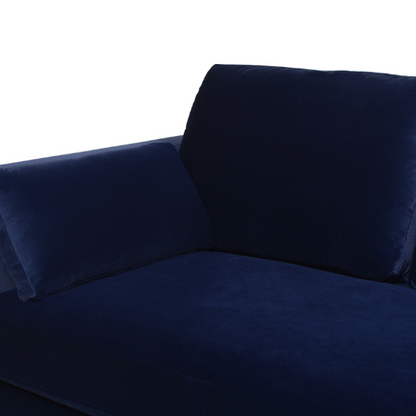 Navy blue velvet 3-seater sofa with feather-down cushions, track arms, and solid wood legs, designed for modern and transitional interiors.

