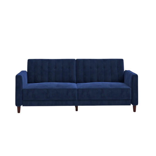 Navy blue velvet convertible sofa with vertical tufting, square arms, and brown tapered legs, designed with a split-back reclining feature and twin bed conversion.
