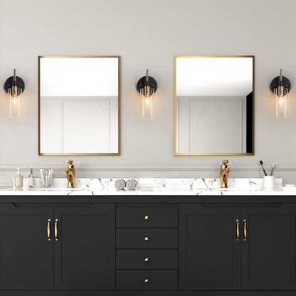 Nordic modern wall sconce with matte black finish, electroplated brass arm, and clear cylindrical glass shade – stylish uplight or downlight fixture

