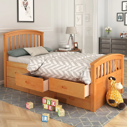 Oak twin bed frame made of solid pine wood with underbed storage drawers, eco-friendly finish, and slatted base, ideal for children or teens in a rustic or modern bedroom.

