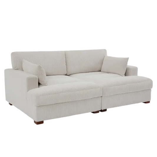 Off-white corduroy convertible sleeper sofa with adjustable headrest, twin bed functionality, and mid-century wooden legs