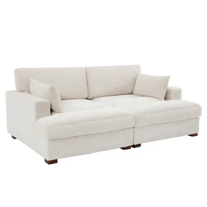 Off-white corduroy convertible sleeper sofa with adjustable headrest, twin bed functionality, and mid-century wooden legs