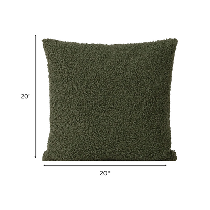 Olive drab bouclé throw pillow with textured loop fabric, square accent pillow on neutral sofa

