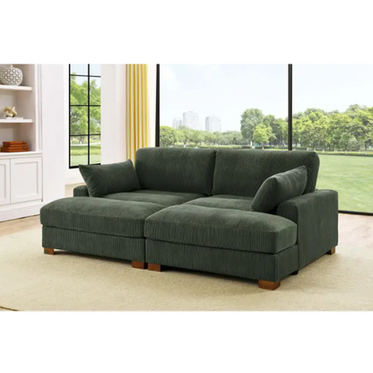 Olive drab corduroy convertible sleeper sofa with adjustable headrest, twin bed function, and mid-century wood legs