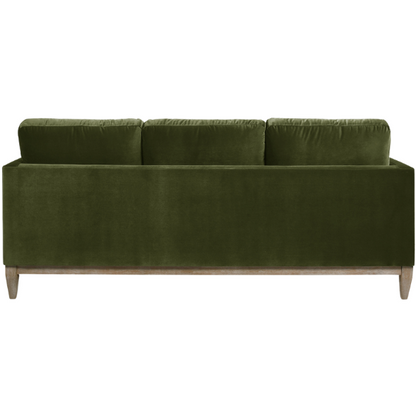 Olive green velvet 3-seater sofa with track arms, feather-down cushions, and natural wood base, ideal for modern and transitional living rooms.

