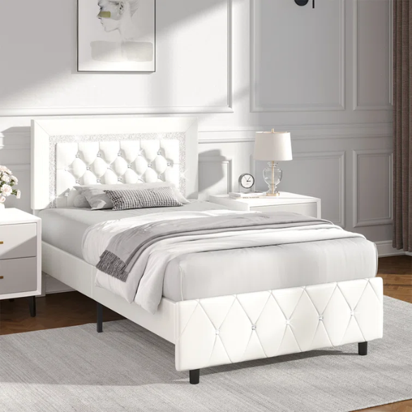 Elegant pearlized white twin bed frame with crystal-tufted headboard, faux leather upholstery, and no box spring required.

