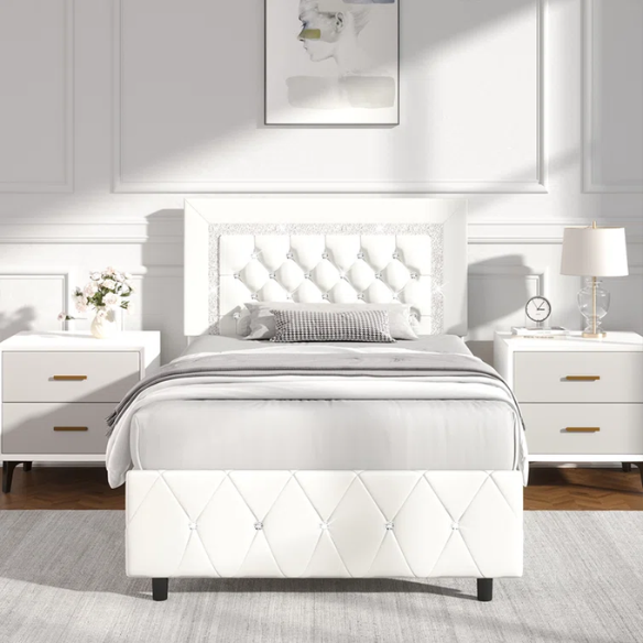 Elegant pearlized white twin bed frame with crystal-tufted headboard, faux leather upholstery, and no box spring required.

