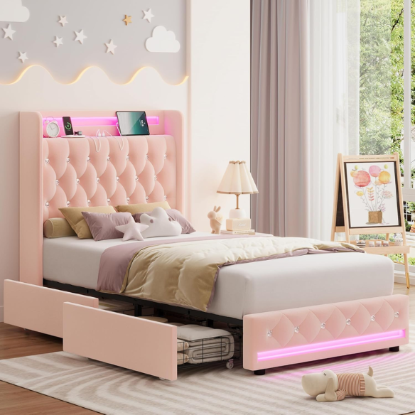 Pink velvet twin bed with LED-lit tufted headboard, crystal buttons, USB charging ports, and underbed storage drawers