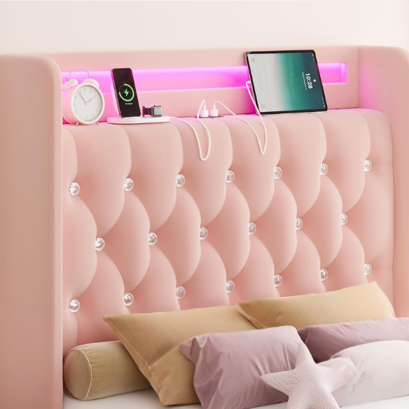 Pink velvet twin bed with LED-lit tufted headboard, crystal buttons, USB charging ports, and underbed storage drawers