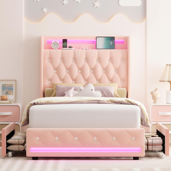 Pink velvet twin bed with LED-lit tufted headboard, crystal buttons, USB charging ports, and underbed storage drawers