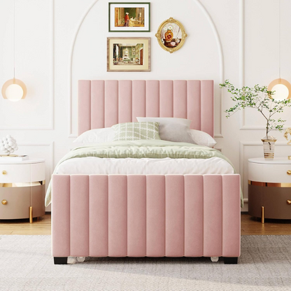 Pink twin upholstered platform bed with tufted velvet headboard and pull-out trundle, designed for kids, teens, or guest rooms, featuring a soft pink finish and space-saving design.

