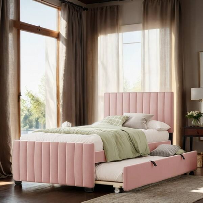 Pink twin upholstered platform bed with tufted velvet headboard and pull-out trundle, designed for kids, teens, or guest rooms, featuring a soft pink finish and space-saving design.

