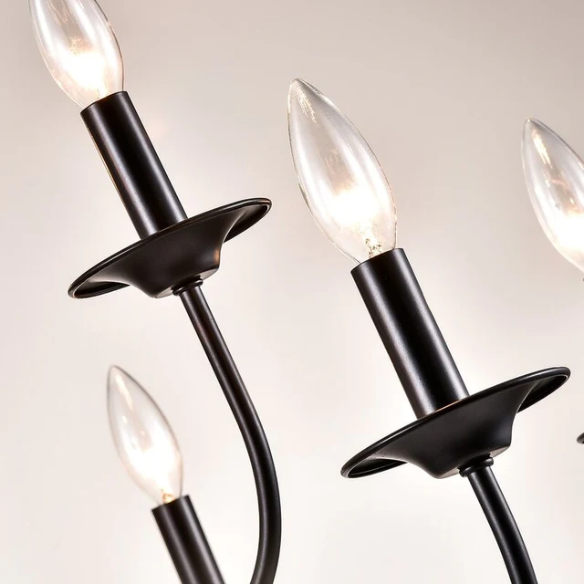 9-light candle-style chandelier with rustic metal finish and curved arms, perfect for farmhouse dining rooms or entryways


