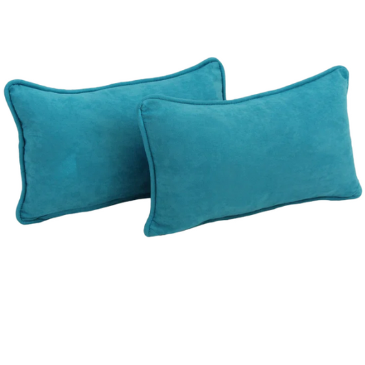 Set of 2 aqua microsuede lumbar throw pillows with piped edges on modern sofa

