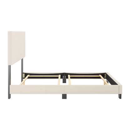Beige full-size upholstered bed with a high rectangular bouclé headboard, cushioned frame, and clean modern lines, shown in a neutral-toned bedroom.

