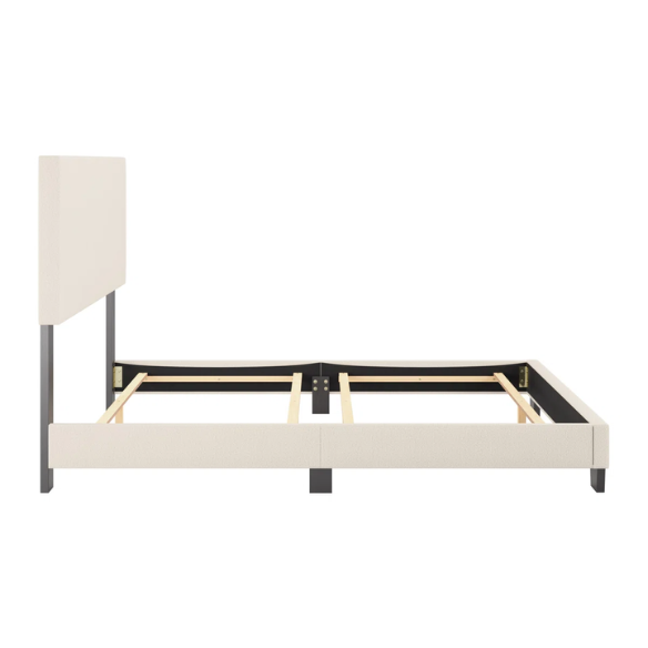 Beige full-size upholstered bed with a high rectangular bouclé headboard, cushioned frame, and clean modern lines, shown in a neutral-toned bedroom.

