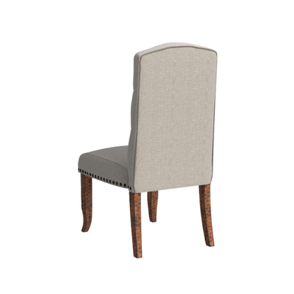 Set of 2 beige button-tufted farmhouse dining chairs with rustic wood legs, nailhead trim, and upholstered linen-like fabric.

