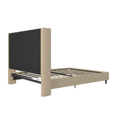 Beige canvas queen bed with tall wingback headboard and black conical legs, styled in a modern bedroom setting.

