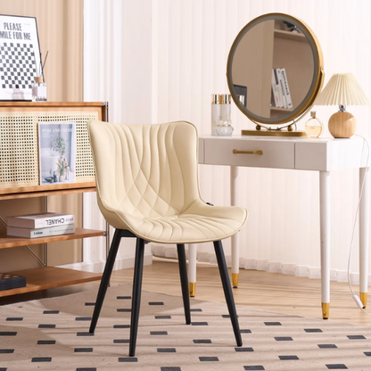 Set of 2 beige faux leather dining chairs with modern fishtail backrest and black metal legs, designed for contemporary dining spaces.

