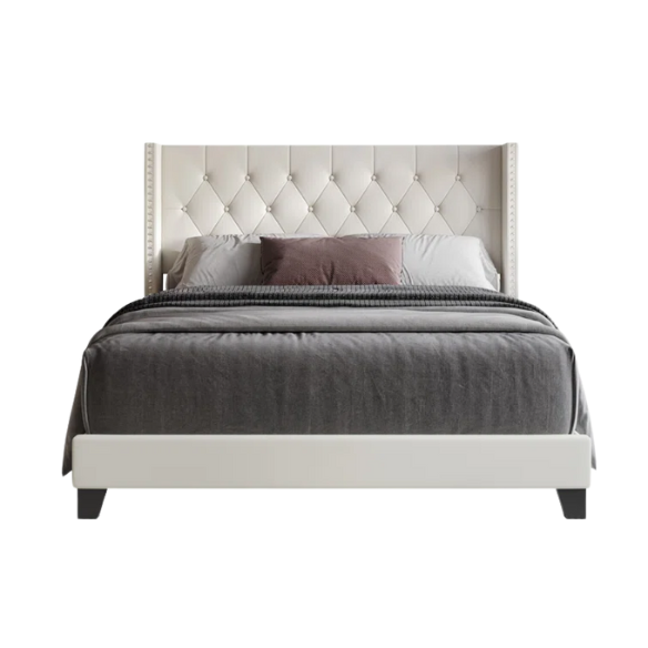 Beige full size upholstered platform bed with tufted wingback headboard, faux leather finish, and decorative nailhead trim on a solid wood frame.

