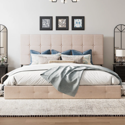 Beige upholstered queen platform bed with block-tufted headboard and four underbed drawers for extra storage.

