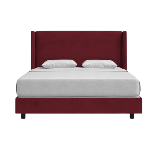 Berry red king-size upholstered bed in linen fabric with wingback headboard and black metal legs.


