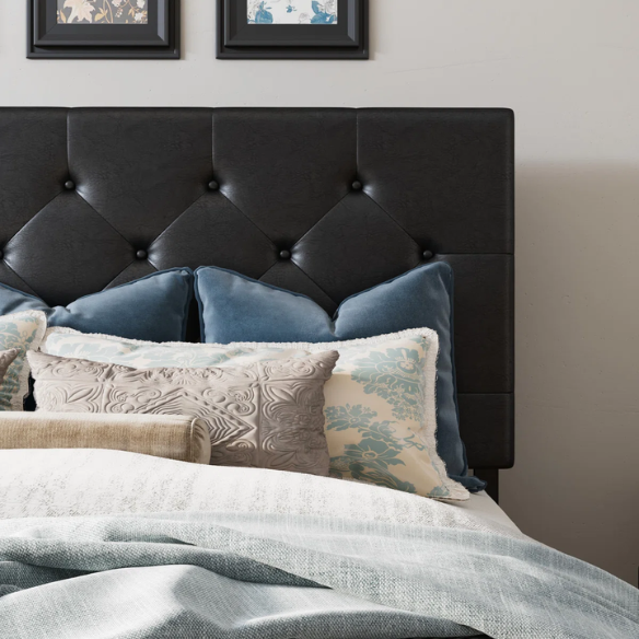 Black faux leather queen platform bed with diamond-tufted headboard and four spacious underbed storage drawers.

