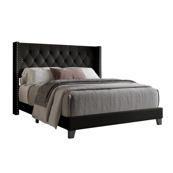 Black full size upholstered platform bed with wingback tufted headboard, silver nailhead trim, and PU faux leather finish on a wood frame.

