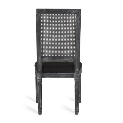 Set of 6 black and grey French country dining chairs with cane backs and upholstered grey seats, featuring fluted legs and rustic charm.

