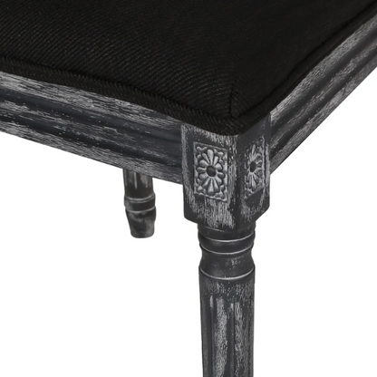 Set of 6 black and grey French country dining chairs with cane backs and upholstered grey seats, featuring fluted legs and rustic charm.

