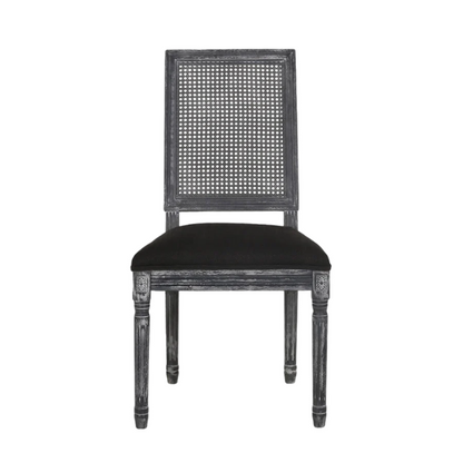 Set of 6 black and grey French country dining chairs with cane backs and upholstered grey seats, featuring fluted legs and rustic charm.

