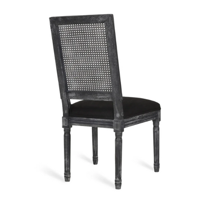 Set of 6 black and grey French country dining chairs with cane backs and upholstered grey seats, featuring fluted legs and rustic charm.

