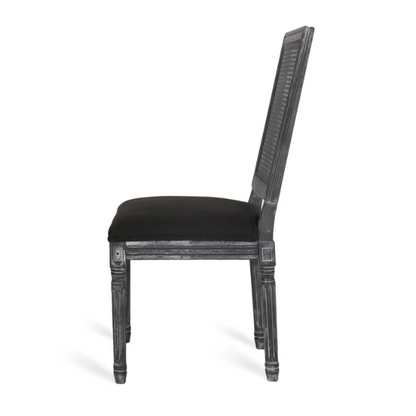 Set of 6 black and grey French country dining chairs with cane backs and upholstered grey seats, featuring fluted legs and rustic charm.

