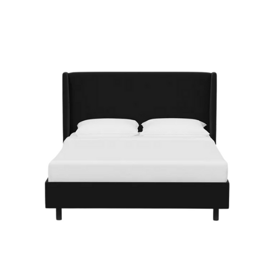 Black king-size upholstered bed in twill fabric with wingback headboard and low-profile black metal legs.

