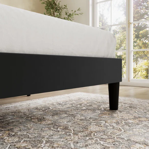 Black velvet queen-size upholstered bed with tufted wingback headboard, 8-inch clearance, and solid wood frame.

