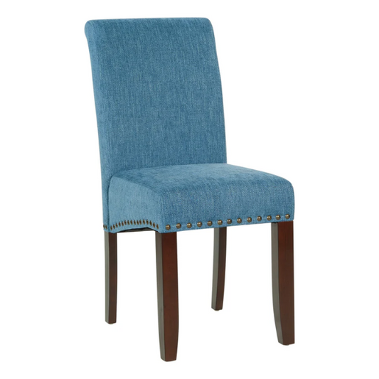 Blue denim upholstered Parsons chair with scrolled back, antique bronze nailhead trim, and solid wood legs