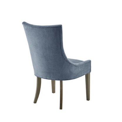 Set of 2 upholstered armless dining chairs in rich blue chenille with solid wood legs, high backs, and piped detailing.

