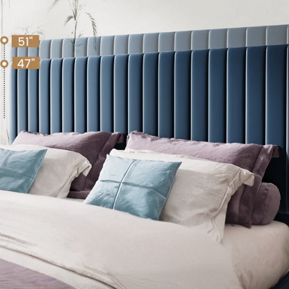 Blue velvet upholstered queen bed with tufted rectangular headboard and low-profile frame.

