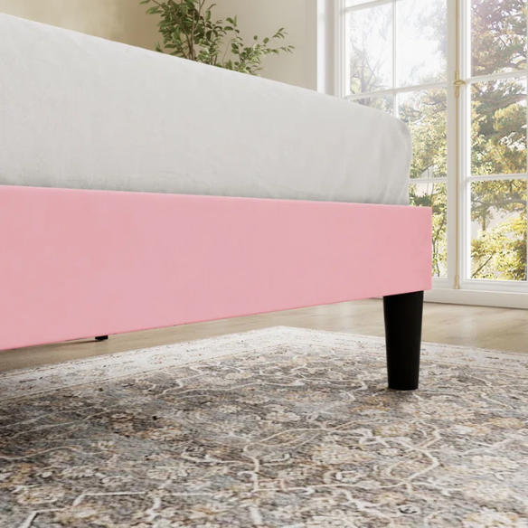 Blush pink velvet queen bed with tufted wingback headboard, 8-inch underbed clearance, and solid wood frame.

