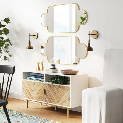 Brass plug-in wall sconce with adjustable swing arm and bell shade, featuring a built-in switch and cord cover for modern bedroom or reading nook lighting

