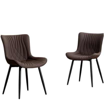 Set of 2 brown faux leather dining chairs with fishtail tufted backs and black metal legs, ideal for modern or rustic dining spaces.

