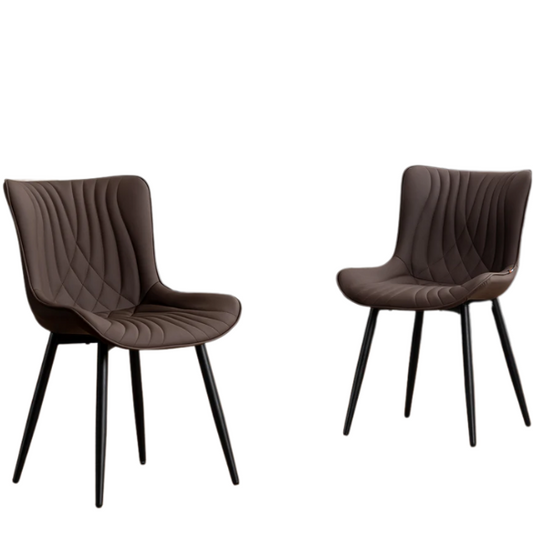 Set of 2 brown faux leather dining chairs with fishtail tufted backs and black metal legs, ideal for modern or rustic dining spaces.

