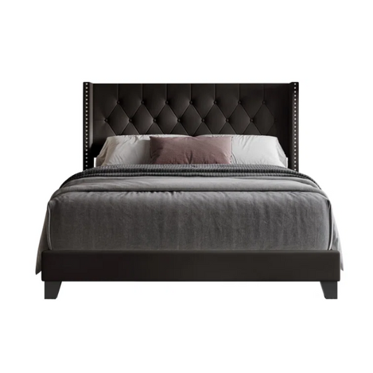 Queen-size bed in brown faux leather with tufted wingback headboard, nailhead trim, and low-profile wooden frame.

