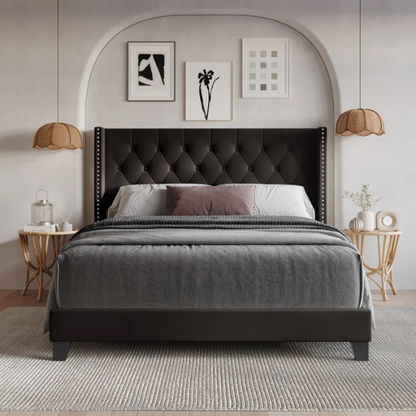 Queen-size bed in brown faux leather with tufted wingback headboard, nailhead trim, and low-profile wooden frame.

