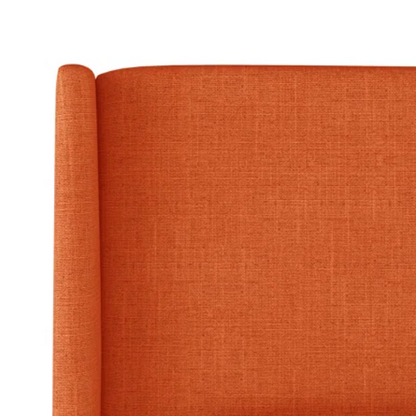 Burnt orange king-size upholstered bed in linen fabric with wingback headboard and black metal legs.

