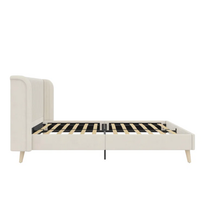 Light cream velvet upholstered queen platform bed with wingback tufted headboard and mid-century angled wood legs.

