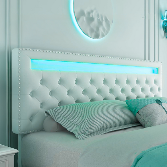 Cream white velvet full size platform bed with adjustable LED tufted headboard, silver nailhead trim, and four underbed storage drawers on wheels