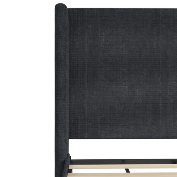 Dark blue canvas queen-size platform bed with tall wingback headboard and black tapered legs.

