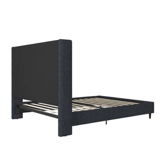 Dark blue canvas queen-size platform bed with tall wingback headboard and black tapered legs.

